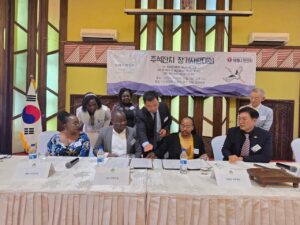 Signing the MoU at Safari Park Hotel, Nairobi